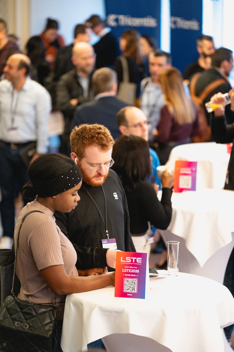 Attendees chatting at a cocktail table during LSTE 2025