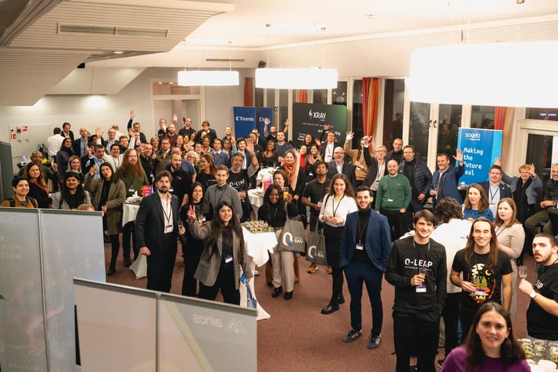 A large group of attendees cheering at the LSTE 2025 evening reception