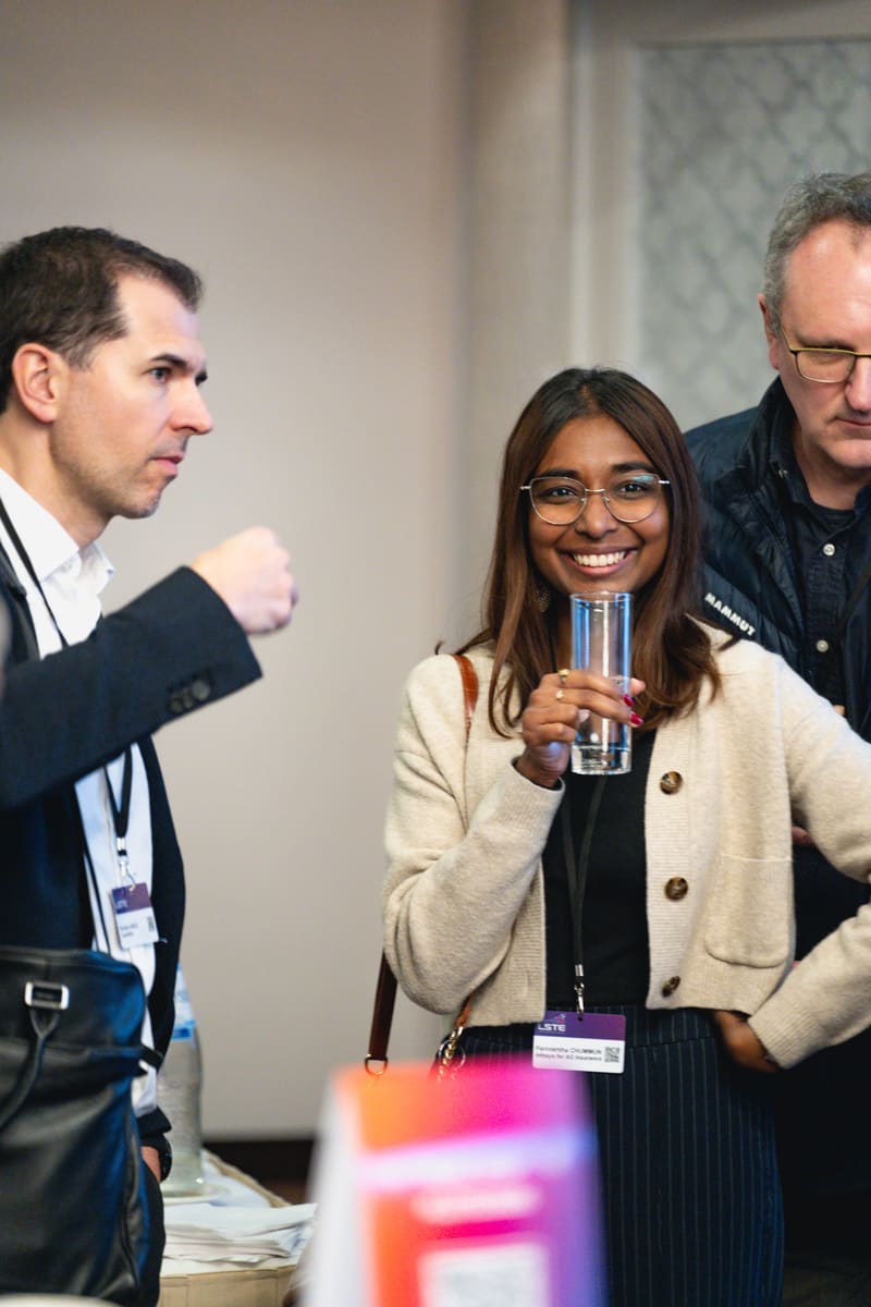 Attendees chatting during a networking break at LSTE 2025