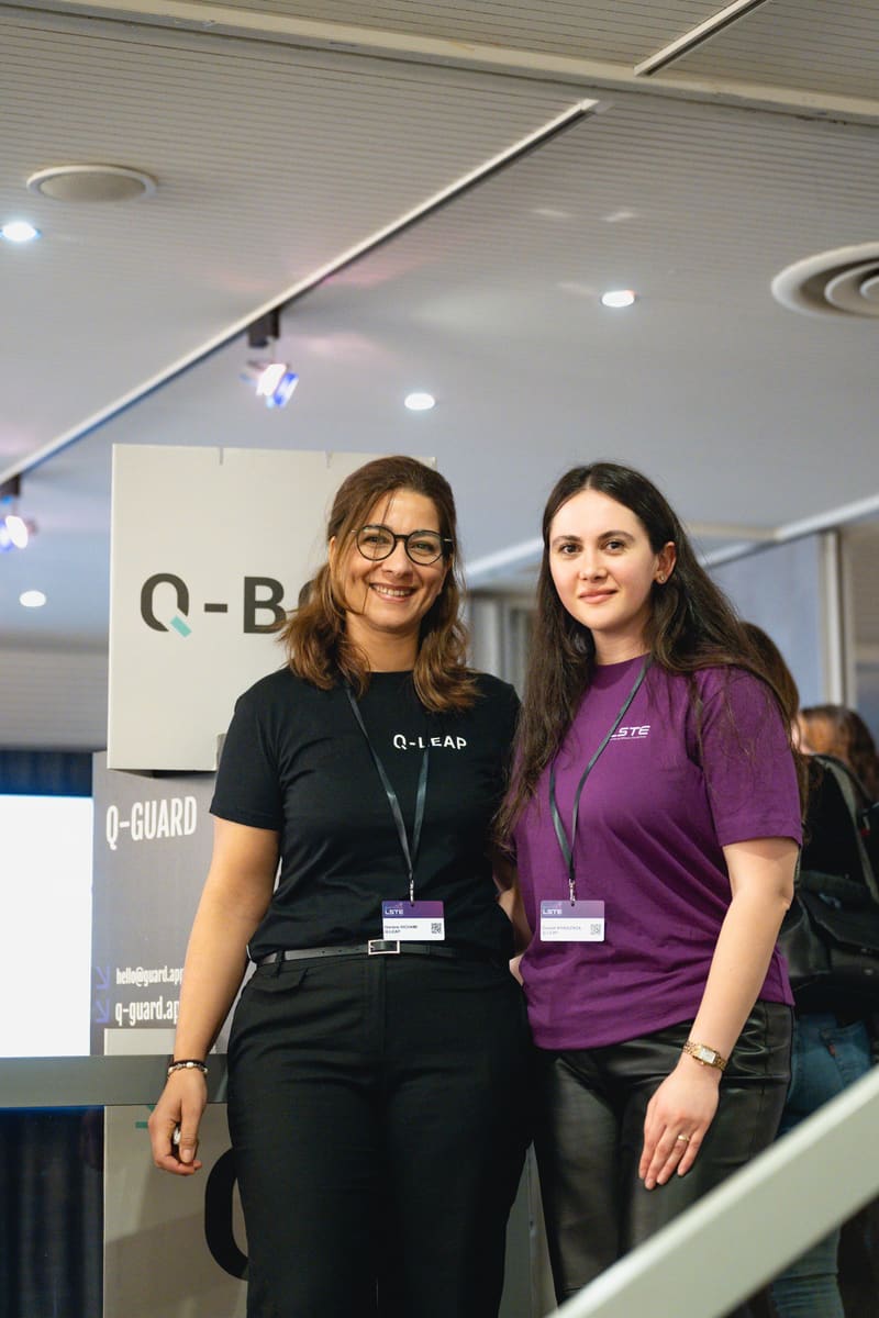 Q-Leap team members at the Q-Guard booth, LSTE 2025