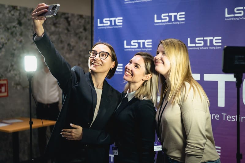 Three attendees taking a selfie at LSTE 2025