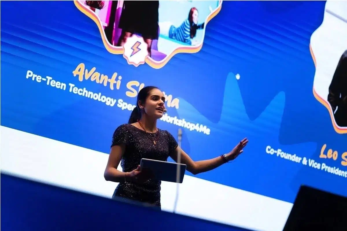 Avanti Sharma presenting on stage